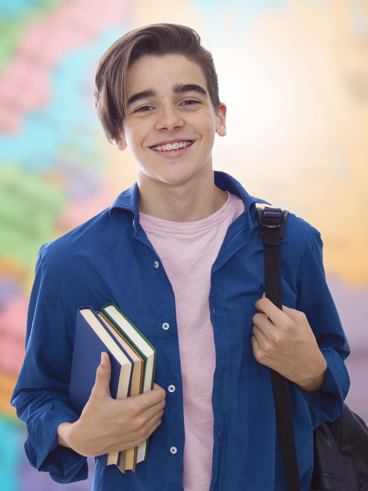 young teenager student with books